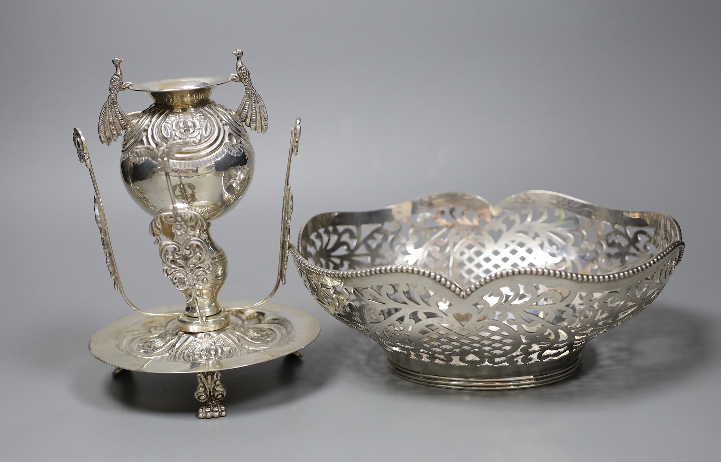A Chilean .900 silver centrepiece, 18cm., and a pierced white metal basket